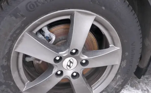 how to grease brake pads without removing tire